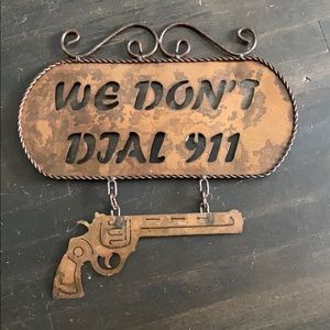 “We Don’t Dial 911” Sign